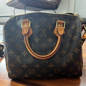 LOUIS VUITTON monogram speedy bandoulière 25 with upgraded strap.